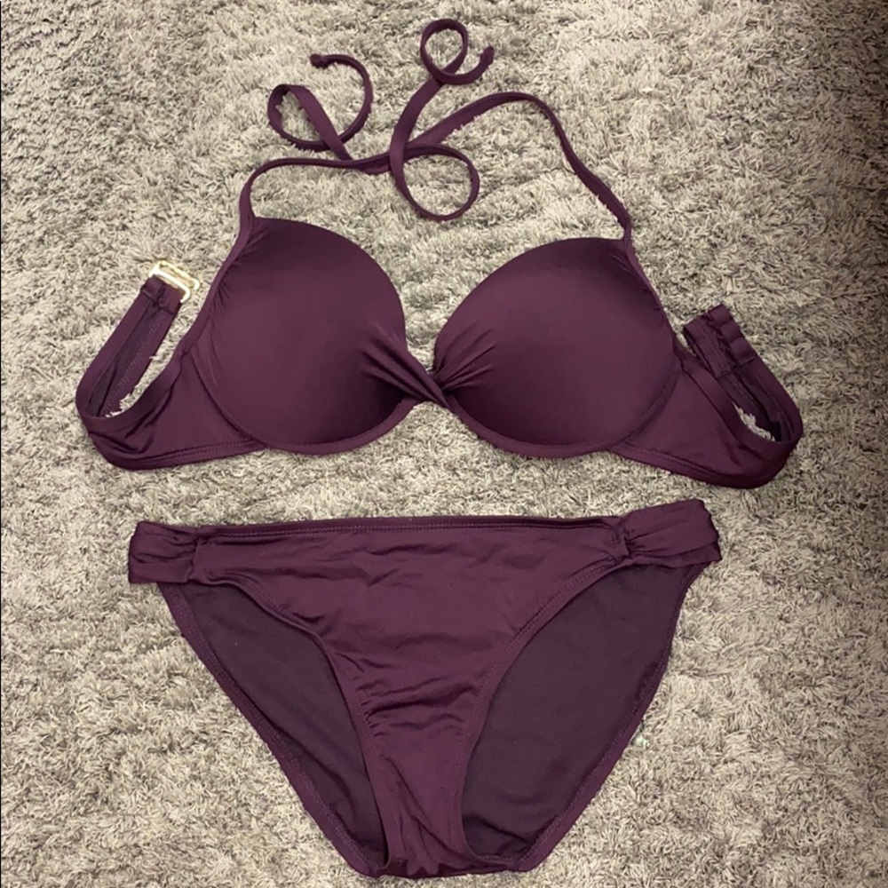 Like new. Plum bathing suit Sz M